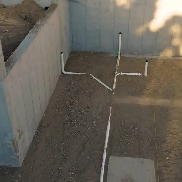 Basement plumbing rough-in with pipes and drain connections for Plumbing Services in Lebanon, PA | Full List
