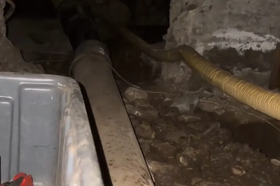 Basement plumbing rough-in with pipes and drain connections illustrating Protecting Your Pipes Through a Lebanon Valley Winter