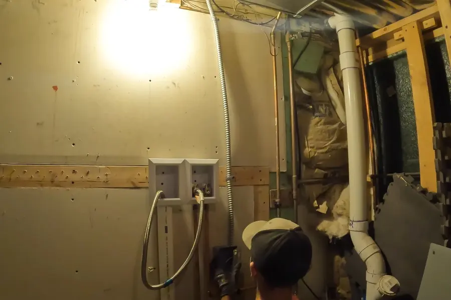 Basement plumbing rough-in with pipes and drain connections illustrating Whole-Home Repipe: Signs Your Lebanon Pipes Are Done