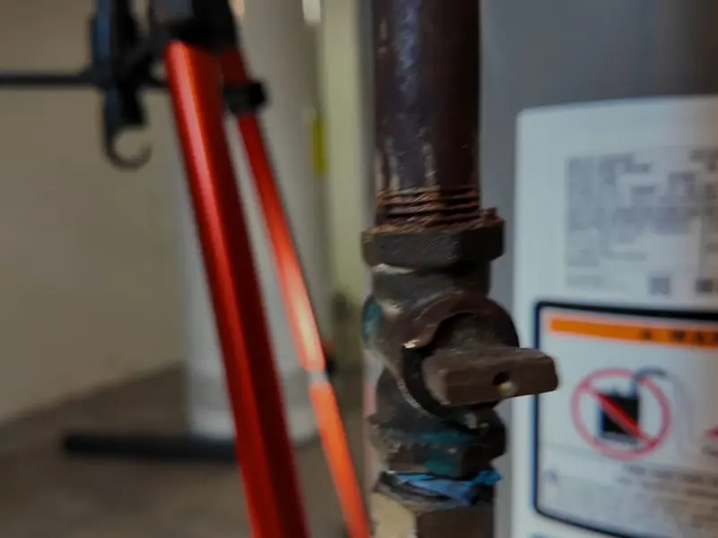 Gas water heater tank with nearby piping for a plumbing service page in Campbelltown, PA (Campbelltown, PA Plumber | South Londonderry detail)
