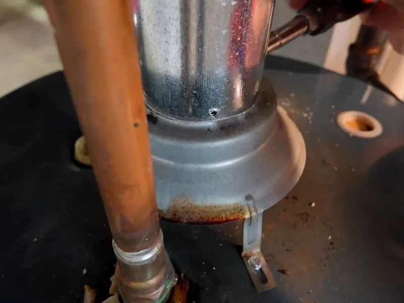 Gas water heater tank with nearby piping for a plumbing service page in Coleman Memorial Park area, Lebanon, PA