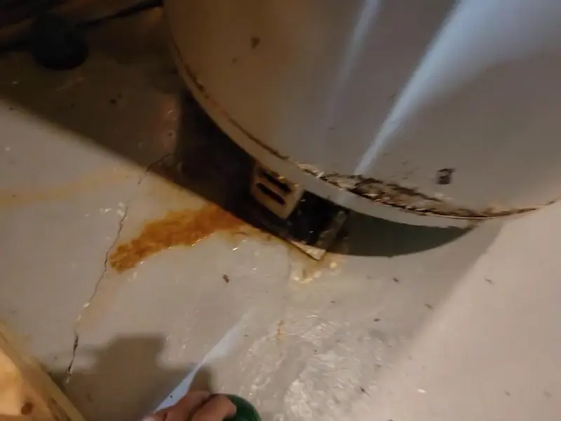 Gas water heater tank with nearby piping for a plumbing service page in Fredericksburg, PA