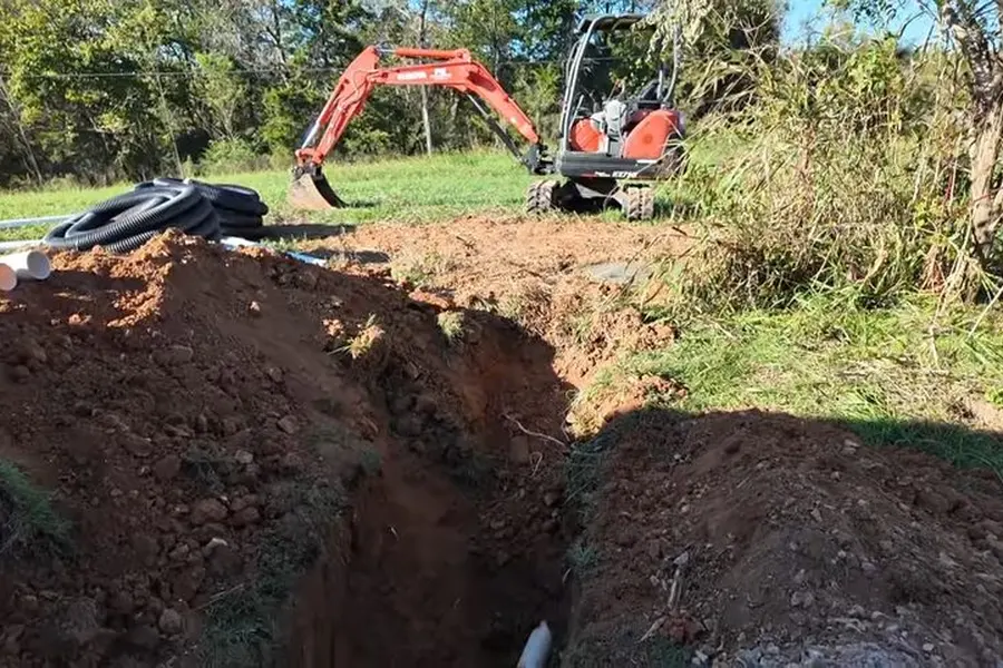 Open trench with new sewer or water line pipe for Sewer Line Replacement in Lebanon, PA | Permitted (Sewer Line Replacement in Lebanon, PA | Permitted closeup)