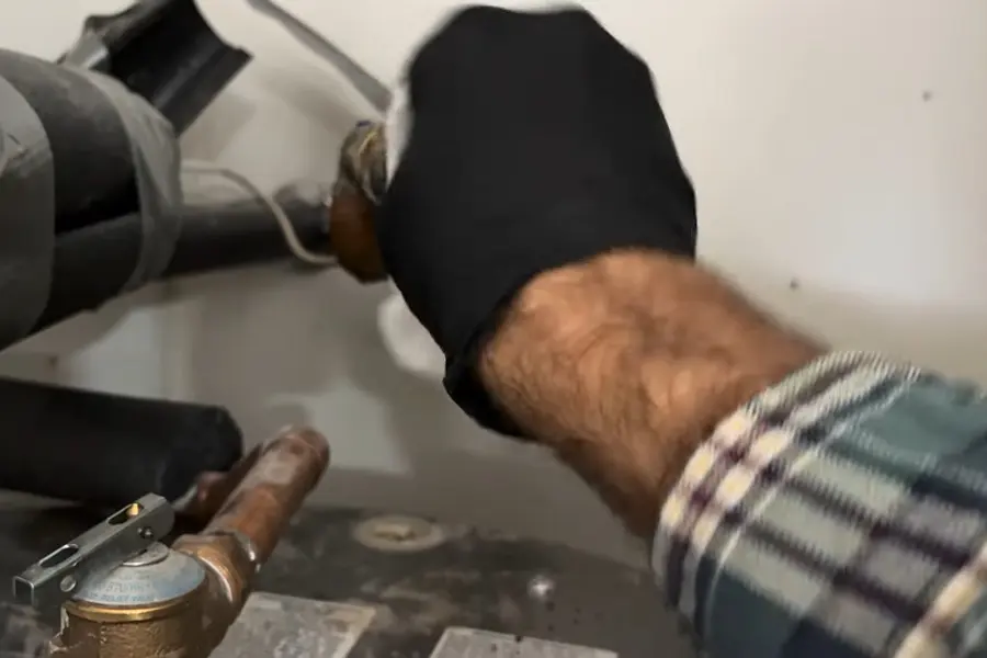 Water heater tank, valve, or repair component illustrating Repair or Replace Your Water Heater? Lebanon Guide (Repair or Replace Your Water Heater? Lebanon Guide closeup)