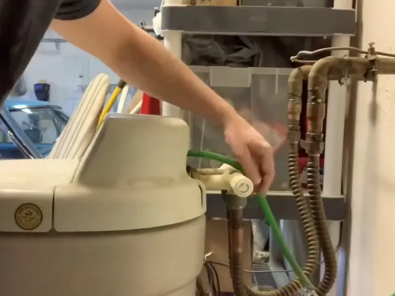 Water softener equipment with control head and brine tank for a plumbing service page in Cornwall, PA