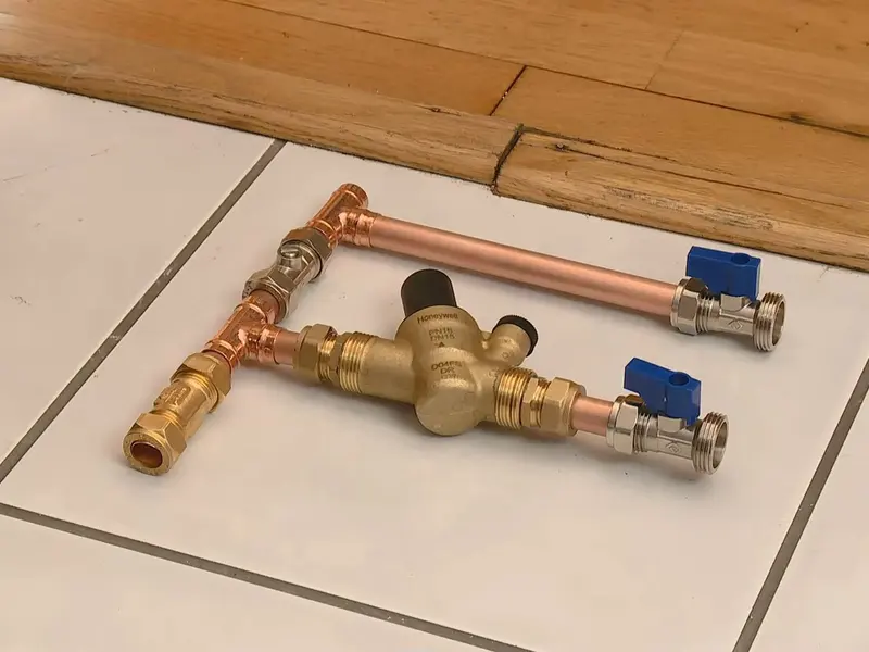 Water softener equipment with control head and brine tank for a plumbing service page in Jonestown, PA